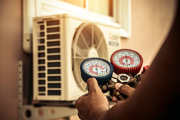 Professional Ac Installation technician working in Hills, IA